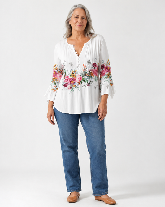 Puawai floral blouse worn with denim, full length