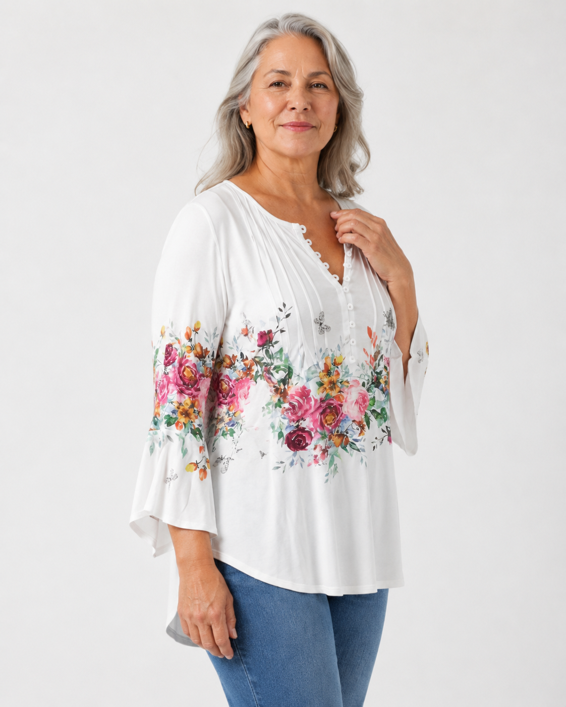 Puawai floral blouse three-quarter view showing the drape