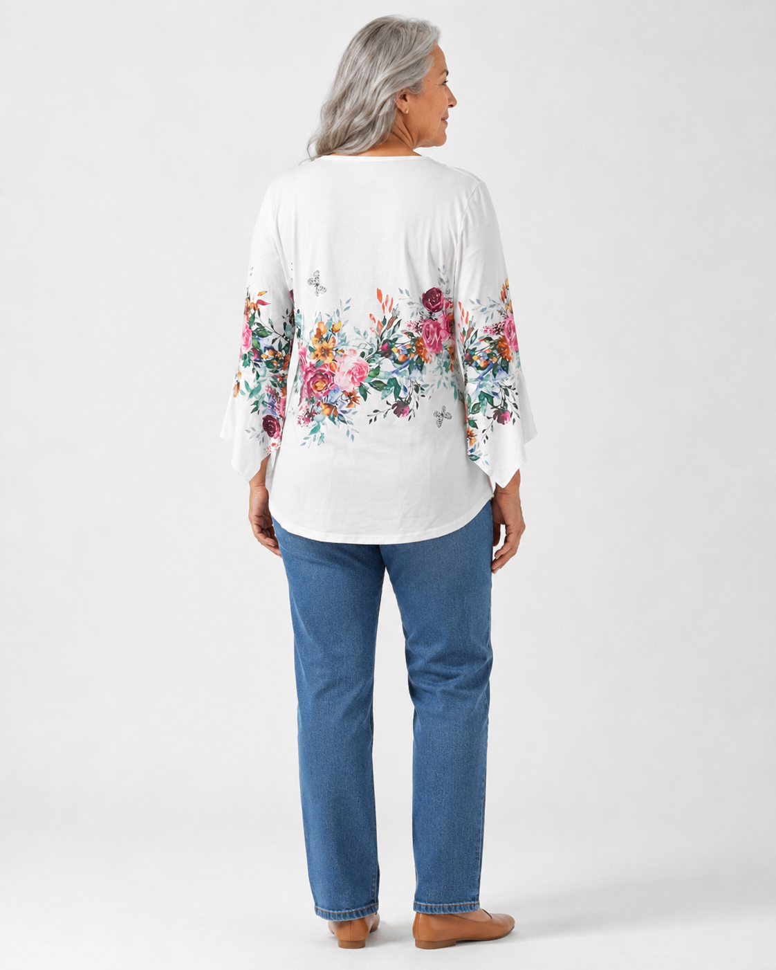 Puawai floral blouse back view, print continues across the back