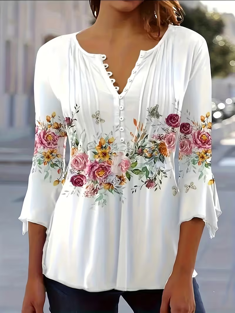 Puawai floral print button blouse worn with denim