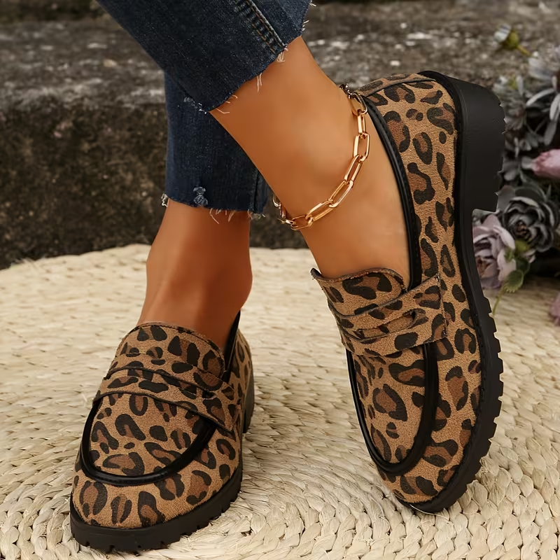 Tui leopard loafer showing the lugged sole and heel